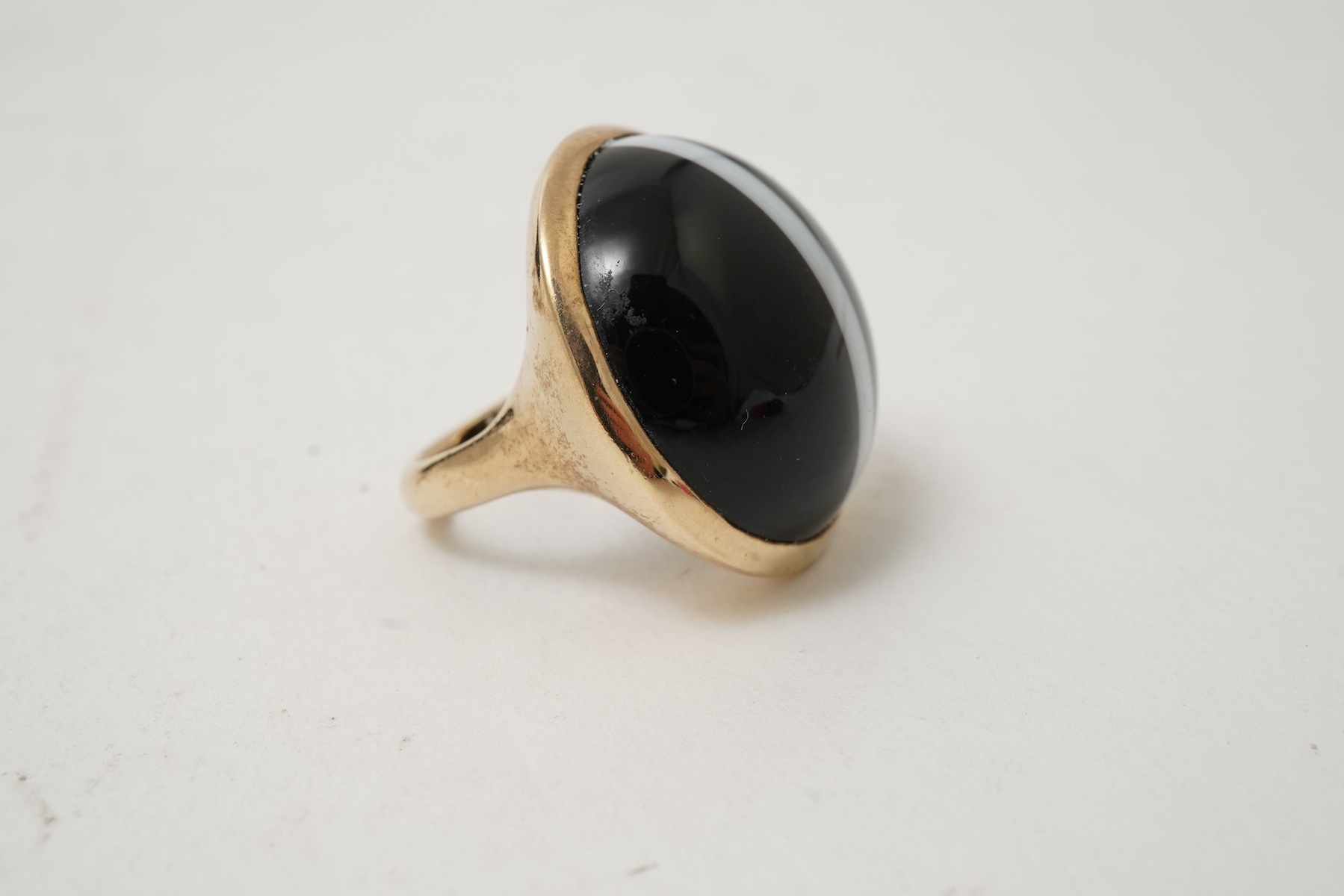 An onyx dress ring and pair of earrings